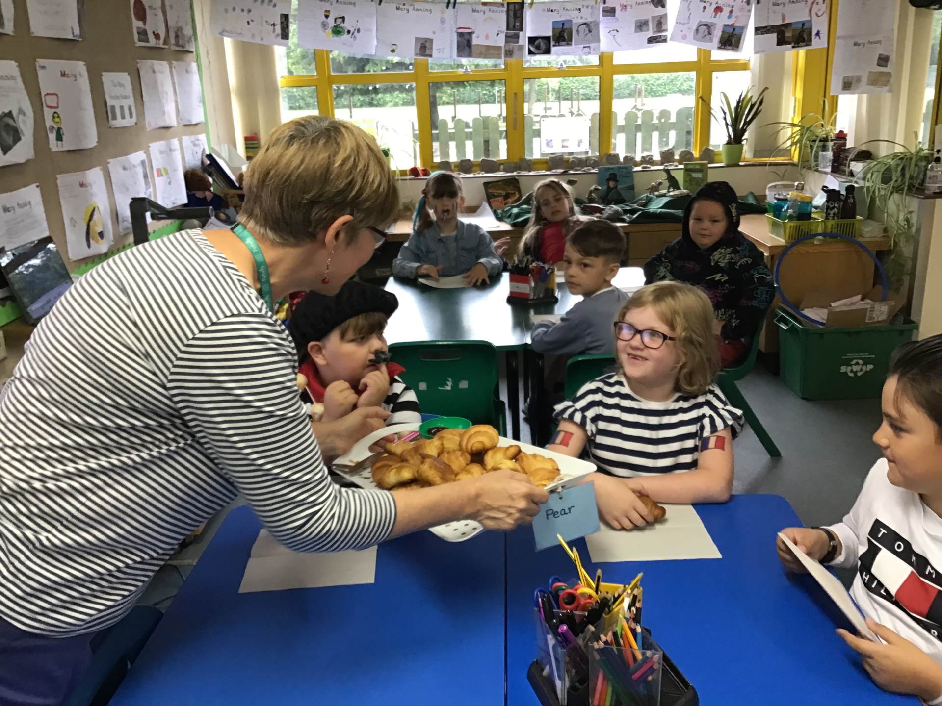 Handing out croissants